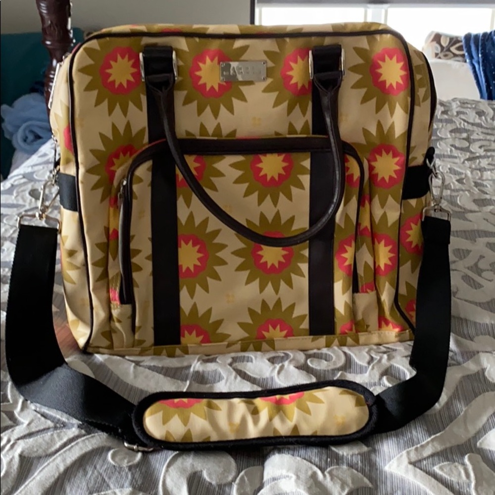 Woman’s vinyl computer case/briefcase.